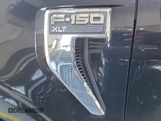 2021 Ford F-150 XL with VIN 1FTFW1E52MFB64744, listed as a IAAI auction lot 42733866 with 98,411 mi miles and . Bid and sale history available at DreamBid. Image 8.