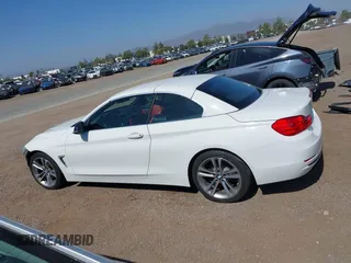 2015 BMW 4 Series 428i z VIN WBA3V7C58FP771642, wystawiony jako IAAI lot #42524828 z przebiegiem 64 440 mil mil oraz . Historia ofert i sprzedaży dostępna na DreamBid. Obrazek 15.