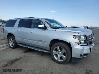 2020 Chevrolet Suburban Premier with VIN 1GNSCJKC0LR216855, listed as a Copart auction lot 72287114 with 94,642 mi miles and Salvage Title. Bid and sale history available at carsss.com. Image 4.