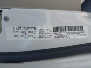 2014 Dodge Grand Caravan SXT with VIN 2C4RDGCG1ER429495, listed as a IAAI auction lot 42058513 with 136,936 mi miles and . Bid and sale history available at DreamBid. Image 9.