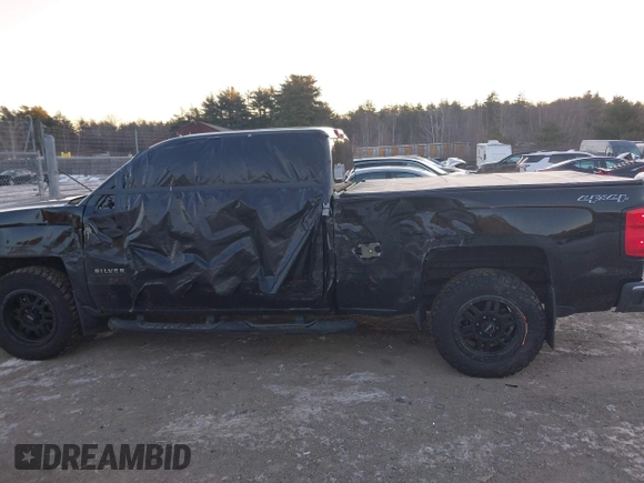 2014 Chevrolet Silverado 1500 LT with VIN 1GCVKREC0EZ399955, listed as a IAAI auction lot 41328346 with 111,162 mi miles and . Bid and sale history available at DreamBid. Image 14.