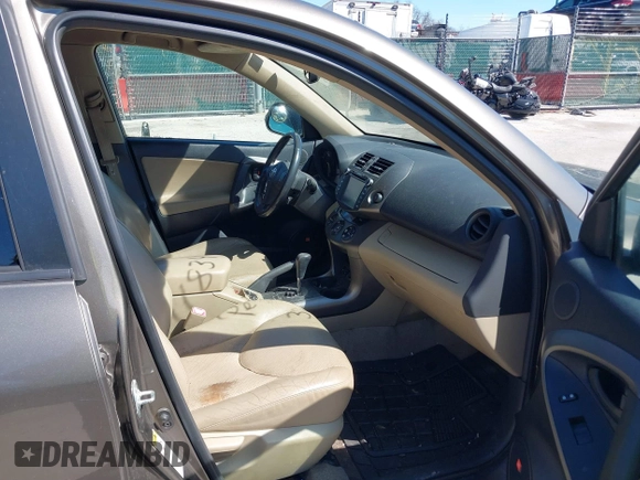 2010 Toyota RAV4 Ltd with VIN JTMDK4DV0AD014466, listed as a IAAI auction lot 41834499 with 121,114 mi miles. Bid and sale history available at carsss.com. Image 5.