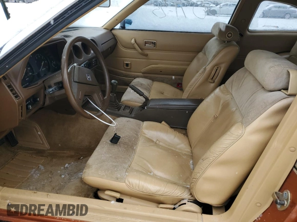 1982 Datsun 280ZX 2+2 z VIN JN1HZ06S8CX435431, wystawiony jako Copart lot #44468595 z przebiegiem 41 956 mil mil oraz Tytuł czysty. Historia ofert i sprzedaży dostępna na DreamBid. Obrazek 7.