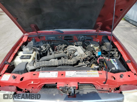 1999 Ford Ranger XL with VIN 1FTYR14V2XPB56627, listed as a Copart auction lot 57036435 with 215,050 mi miles and Salvage title. Bid and sale history available at DreamBid. Image 11.