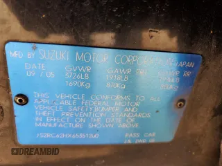 2006 Suzuki Aerio Premium z VIN JS2RC62HX65351200, wystawiony jako Copart lot #88077405 z przebiegiem 165 431 mil mil oraz Szkoda całkowita • Salvage title. Historia ofert i sprzedaży dostępna na DreamBid. Obrazek 14.