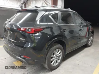 2024 Mazda CX-5 S Select with VIN JM3KFBBL1R0489541, listed as a IAAI auction lot 41820699 with 12,072 mi miles and . Bid and sale history available at DreamBid. Image 4.