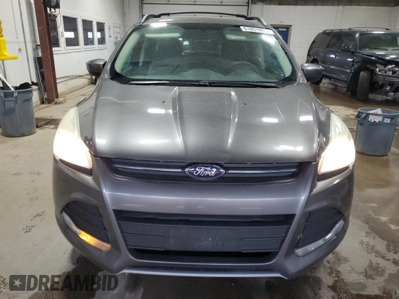 2013 Ford Escape SE with VIN 1FMCU9G96DUB33138, listed as a Copart auction lot 61851665 with 148,742 mi miles and Salvage title. Bid and sale history available at DreamBid. Image 5.