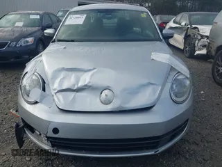 2016 Volkswagen Beetle SE с VIN 3VWJ17AT3GM606917, выставлен на аукционе IAAI как лот 41728053 с пробегом Не указан миль и . История ставок и продаж доступна на DreamBid. Изображение 12.