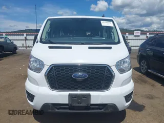 2021 Ford Transit Passenger XL z VIN 1FBAX2Y87MKA31170, wystawiony jako IAAI lot #42348150 z przebiegiem 60 124 mil mil oraz . Historia ofert i sprzedaży dostępna na DreamBid. Obrazek 12.
