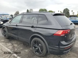 2023 Volkswagen Tiguan SE R-Line Black z VIN 3VVCB7AXXPM033818, wystawiony jako Copart lot #48759425 z przebiegiem 24 260 mil mil oraz Szkoda całkowita • Salvage title. Historia ofert i sprzedaży dostępna na DreamBid. Obrazek 2.