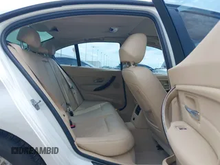 2013 BMW 3 Series 328i with VIN WBA3A5C5XDJ461783, listed as a IAAI auction lot 42150355 with 115,992 mi miles and . Bid and sale history available at DreamBid. Image 8.