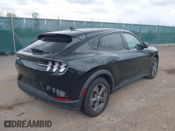 2021 Ford Mustang Mach-E Select with VIN 3FMTK1SS4MMA21329, listed as a IAAI auction lot 42241810 with 35,700 mi miles and . Bid and sale history available at DreamBid. Image 4.