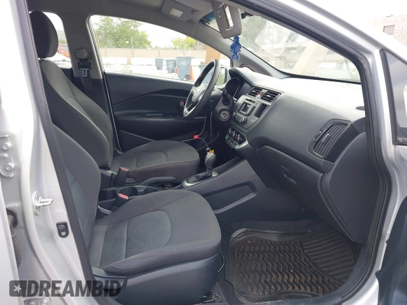 2014 Kia Rio LX with VIN KNADM4A3XE6363851, listed as a IAAI auction lot 42111189 with 144,122 mi miles and . Bid and sale history available at DreamBid. Image 5.