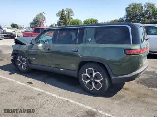 2023 Rivian R1S Adventure with VIN 7PDSGABAXPN005180, listed as a Copart auction lot 66652024 with 0 mi miles and Salvage Title. Bid and sale history available at carsss.com. Image 2.