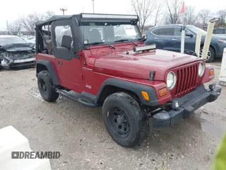 1999 Jeep Wrangler SE with VIN 1J4FY29P6XP408738, listed as a IAAI auction lot 41716999 with 124,692 mi miles. Bid and sale history available at carsss.com. Image 1.