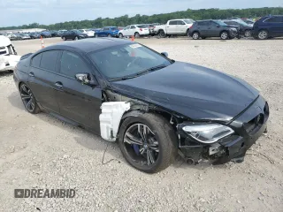 2016 BMW M6 z VIN WBS6E9C53GGF92689, wystawiony jako Copart lot #60226324 z przebiegiem Nie podano mil oraz Szkody całkowita. Historia ofert i sprzedaży dostępna na DreamBid. Obrazek 4.