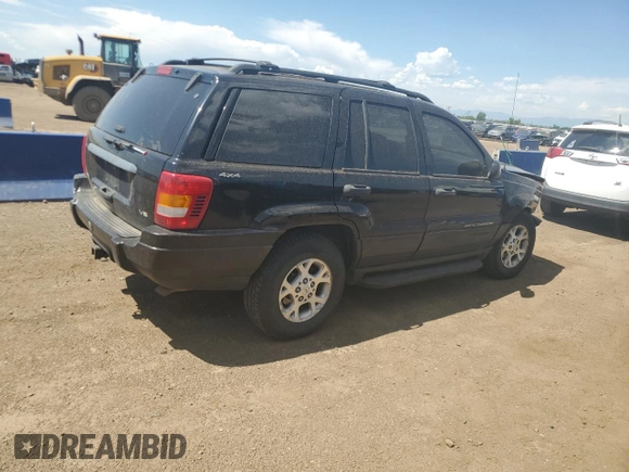 2000 Jeep Grand Cherokee Laredo z VIN 1J4GW48N0YC210235, wystawiony jako Copart lot #60558905 z przebiegiem 131 108 mil mil oraz Szkoda całkowita • Salvage title. Historia ofert i sprzedaży dostępna na DreamBid. Obrazek 3.