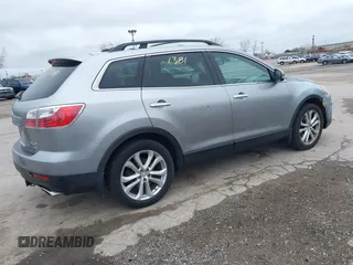 2011 Mazda CX-9 Grand Touring with VIN JM3TB3DA9B0316194, listed as a IAAI auction lot 42091381 with 164,198 mi miles. Bid and sale history available at carsss.com. Image 4.
