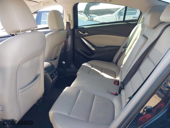 2017 Mazda Mazda6 Touring with VIN JM1GL1V57H1129309, listed as a IAAI auction lot 41654988 with 117,705 mi miles. Bid and sale history available at carsss.com. Image 8.