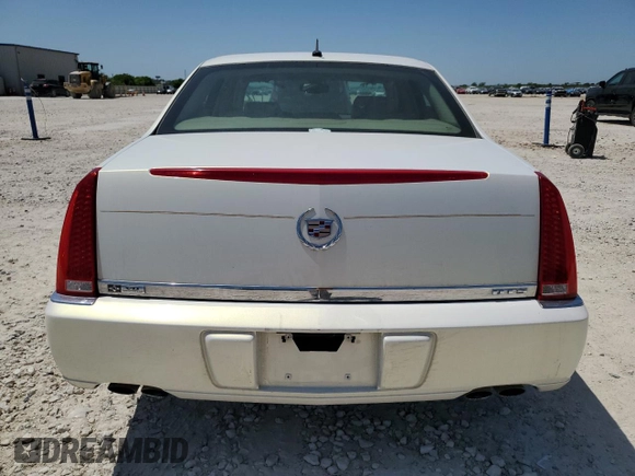 2006 Cadillac DTS 1SB z VIN 1G6KD57Y86U126164, wystawiony jako Copart lot #52686965 z przebiegiem 153 426 mil mil oraz Szkoda całkowita • Salvage title. Historia ofert i sprzedaży dostępna na DreamBid. Obrazek 6.