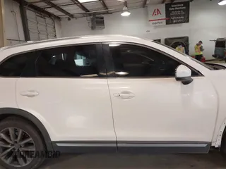 2017 Mazda CX-9 Grand Touring with VIN JM3TCADY5H0132572, listed as a IAAI auction lot 41421008 with 66,656 mi miles and . Bid and sale history available at DreamBid. Image 13.
