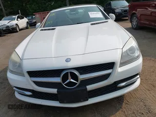 2015 Mercedes-Benz SLK 250 z VIN WDDPK4HA2FF100514, wystawiony jako IAAI lot #42414167 z przebiegiem 120 615 mil mil oraz . Historia ofert i sprzedaży dostępna na DreamBid. Obrazek 12.