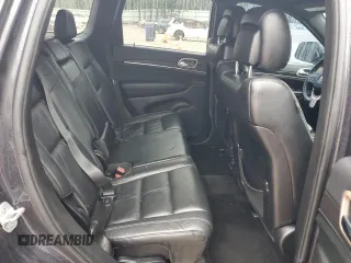 2014 Jeep Grand Cherokee Limited with VIN 1C4RJFBG2EC233725, listed as a Copart auction lot 58524505 with 216,798 mi miles and Salvage title. Bid and sale history available at DreamBid. Image 11.