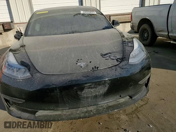 2019 Tesla Model 3 Mid Range with VIN 5YJ3E1EA9KF412525, listed as a Copart auction lot 48689825 with 134,768 mi miles and Salvage Title. Bid and sale history available at DreamBid. Image 11.