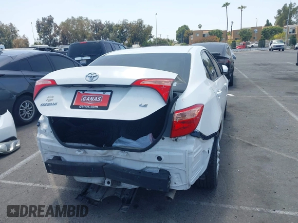 2018 Toyota Corolla L with VIN 5YFBURHE7JP810444, listed as a IAAI auction lot 42558647 with 74,794 mi miles and . Bid and sale history available at DreamBid. Image 17.