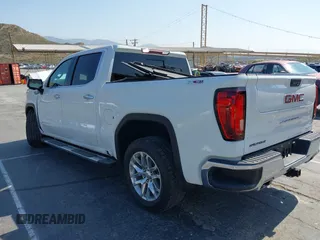 2022 GMC Sierra 1500 SLT with VIN 3GTU9DED3NG156904, listed as a IAAI auction lot 42429722 with 59,717 mi miles and . Bid and sale history available at DreamBid. Image 3.