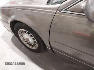 2000 Cadillac DeVille z VIN 1G6KD54Y6YU265538, wystawiony jako IAAI lot #41748755 z przebiegiem 159 676 mil mil oraz . Historia ofert i sprzedaży dostępna na DreamBid. Obrazek 6.