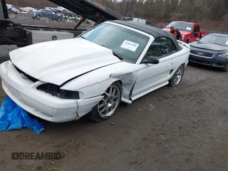 1996 Ford Mustang GT with VIN 1FALP45X7TF201553, listed as a IAAI auction lot 41487690 with 102,015 mi miles. Bid and sale history available at carsss.com. Image 2.