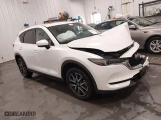 2017 Mazda CX-5 Grand Touring with VIN JM3KFBDL1H0203358, listed as a IAAI auction lot 41526776 with 63,167 mi miles. Bid and sale history available at carsss.com. Image 1.