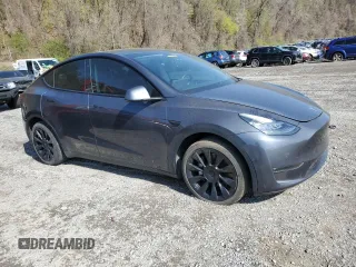 2021 Tesla Model Y Long Range with VIN 5YJYGDEE9MF119974, listed as a Copart auction lot 53794025 with 66,411 mi miles and Salvage Title. Bid and sale history available at DreamBid. Image 4.