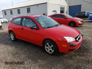 2007 Ford Focus S with VIN 1FAFP31N67W268937, listed as a Copart auction lot 43875925 with 141,786 mi miles and Salvage Title. Bid and sale history available at DreamBid. Image 4.