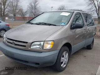 1999 Toyota Sienna LE with VIN 4T3ZF13C5XU121145, listed as a IAAI auction lot 41721171 with 229,760 mi miles and . Bid and sale history available at DreamBid. Image 2.