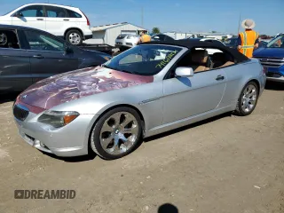 2006 BMW 6 Series 650Ci with VIN WBAEK13456CN78877, listed as a Copart auction lot 74169204 with 114,668 mi miles and Salvage Title. Bid and sale history available at carsss.com. Image 1.