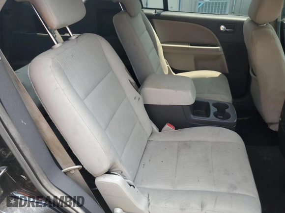 2008 Ford Taurus X SEL with VIN 1FMDK02W08GA29428, listed as a Copart auction lot 58902675 with 256,008 mi miles and Salvage title. Bid and sale history available at DreamBid. Image 10.