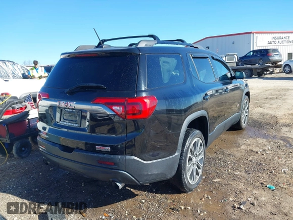 2017 GMC Acadia SLT with VIN 1GKKNVLS2HZ197379, listed as a IAAI auction lot 41684982 with 134,531 mi miles. Bid and sale history available at carsss.com. Image 4.