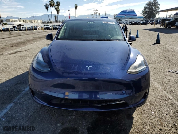 2023 Tesla Model Y Long Range with VIN 7SAYGDEEXPF814469, listed as a Copart auction lot 45982675 with 52,053 mi miles and Salvage Title. Bid and sale history available at carsss.com. Image 5.