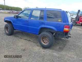 1996 Jeep Grand Cherokee Laredo with VIN 1J4GZ58YXTC329037, listed as a IAAI auction lot 42051175 with 314,571 mi miles and . Bid and sale history available at DreamBid. Image 3.
