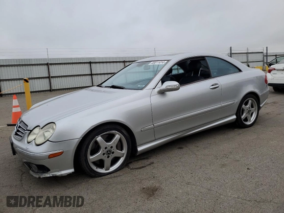 2004 Mercedes-Benz CLK 500 with VIN WDBTJ75J04F110990, listed as a Copart auction lot 85511414 with 251,096 mi miles and Salvage title. Bid and sale history available at DreamBid. Image 1.