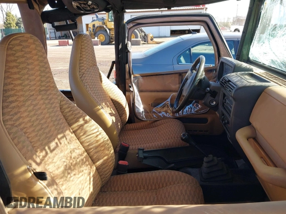 1998 Jeep Wrangler SE with VIN 1J4FY29P6WP709203, listed as a IAAI auction lot 41962877 with 1 mi miles. Bid and sale history available at carsss.com. Image 5.