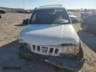 2002 Kia Sportage with VIN KNDJA723625142604, listed as a Copart auction lot 73463704 with 236,260 mi miles and Salvage Title. Bid and sale history available at carsss.com. Image 5.
