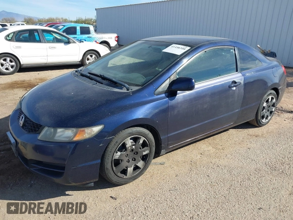2009 Honda Civic Cpe LX with VIN 2HGFG12679H508263, listed as a IAAI auction lot 41498344 with 128,876 mi miles. Bid and sale history available at carsss.com. Image 2.