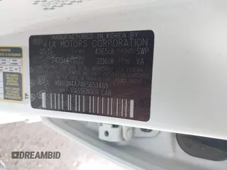 2015 Kia Optima LX with VIN KNAGM4A74F5653459, listed as a IAAI auction lot 42443188 with 109,129 mi miles and . Bid and sale history available at DreamBid. Image 9.