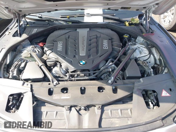 2015 BMW 7 Series 750Li with VIN WBAYE8C5XFD782039, listed as a IAAI auction lot 41505626 with 74,716 mi miles. Bid and sale history available at carsss.com. Image 10.