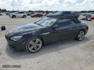 2018 BMW 6 Series 650i with VIN WBA6F5C5XJD997058, listed as a Copart auction lot 70083514 with 0 mi miles and Salvage Title. Bid and sale history available at carsss.com. Image 1.