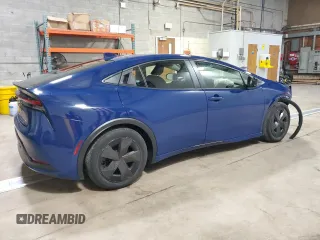 2023 Toyota Prius LE z VIN JTDACAAUXP3010661, wystawiony jako Copart lot #57996225 z przebiegiem 31 166 mil mil oraz Czysty tytuł • Clean title. Historia ofert i sprzedaży dostępna na DreamBid. Obrazek 3.
