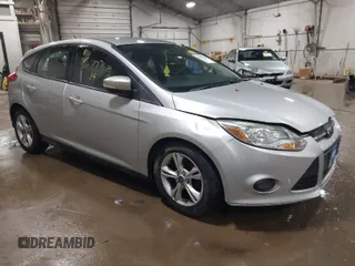 2014 Ford Focus SE with VIN 1FADP3K28EL424177, listed as a IAAI auction lot 41677768 with 104,279 mi miles. Bid and sale history available at carsss.com. Image 1.